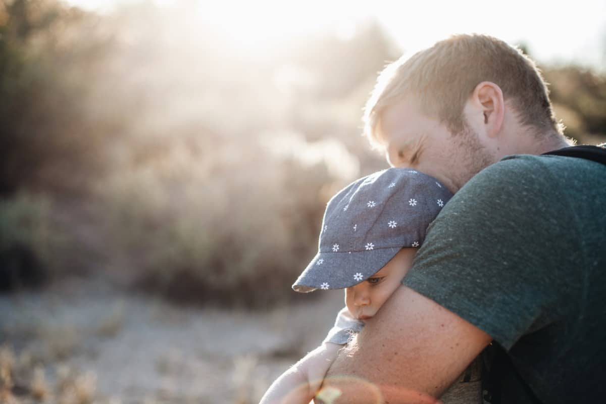 Adoption Dad Hugging Child